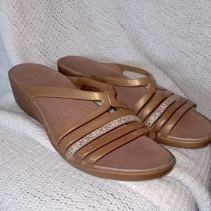 Golden strappy crocs sandal wedges